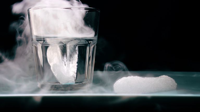 close-up-of-dry-ice-in-drinking-glass-and-table-667753789-581a14033df78cc2e807fc99.jpg